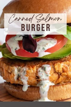 Salmon burger on a wooden board. Teriyaki Salmon Burger, Canned Salmon Burger Recipe, Salmon Patties Burgers, Salmon Burger Recipe Canned, Salmon Burger Meal Ideas, Salmon Hamburger, Canned Salmon Burgers, Salmon Burgers With Canned Salmon, Salmon Burger Toppings