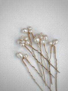 Comes as a set of 5 freshwater pearl hairpins wired in silver, gold or rose gold finish. Please get in touch if you would require any customisation in style or quantity. As each of our pieces is handmade especially for you, we are unable to accept returns/exchanges Bridal Hairpins, Bridal Hair Pins Pearl, Hair Pins Wedding, Hair Pins Bridal, Bridal Hair Pin, Hair Accessories Bridal, Rosé Gold, Pearl Hair Pins, Wedding Hair Pins