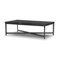 a black table sitting on top of a white floor