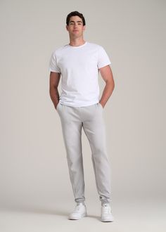 Discover the Ultimate Joggers for Tall Men Comfort Meets Utility in These Tall Men's Jogger Pants Our Utility Joggers redefine the standard for athletic pants. Designed for tall men, these extra-long men's joggers blend a modern fit with practical functionality, perfect for an active lifestyle or a relaxed day. They are the epitome of comfort and utility, tailored for those who are tall and seek style without compromise. Athletic jogger style with a modern fit Stretch fabric and waistband for ma Moisture-wicking Bottoms For Light Sports, Stretch Solid Color Bottoms For Light Sports, Stretch Solid Bottoms For Light Sports, Solid Go-dry Bottoms For Light Sports, Stretch Bottoms For Light Sports, Comfort Stretch Cotton Bottoms For Gym, Moisture-wicking 4-way Stretch Bottoms For Light Sports, Functional White Pants For Jogging, Sportswear Pants With Straight Hem For Sports