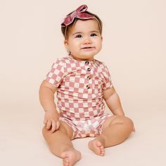 Good things come in pairs and our Shortie Sets are no exception:- the perfect warm weather outfit for boys and girls- now available in sizes 0-3 months up to 6/7!⁃ made from our signature silky-soft material for a stretchy, comfy fit⁃ functional buttons for easy changes⁃ fold-over waistband for room to grow (or to wear high-waisted)⁃ perfect for mixing and matching with your other favorite clothing items! Sizes: Newborn-3 Month: 6-12 pounds // 18-22” long 3-6 Month: 12-16 pounds // 22-27” long 6-12 Month: 16-20 pounds // 26-30” long 12-24 Month: 20-30 pounds // 29-33” long 2T : 28-34 pounds // 32-37” long 3T : 33-38 pounds // 36-42” long 4/5 : 37-45 pounds // 40-45" long 6/7 : 44-55 pounds // 45 -51" long Color: Rose Pink Checkered Cute Stretch Onesie For Summer, Cute Stretch Summer Onesie, Family Matching Fitted Sets For Summer, Summer Family Matching Fitted Sets, Fitted Family Matching Sets For Summer, Cute Fitted Onesie For Loungewear, Unisex Onesie For Spring Playtime, Spring Family Matching Playwear For Babies, Summer Playful Unisex Onesie