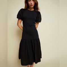 A Pared Back Elegant Vibe With Girly Touches, Like The Romantic Cotton Poplin Bubble Sleeve And Flounce Hem. You Get The Best Of Both Worlds With All The Comfort Of An Easy T-Shirt. Heavy Slub/ 100% Cotton Machine Wash Black Midi Dress With Ruffle Hem For Brunch, Black Puff Sleeve Dress For Brunch, Black Puff Sleeve Dress For Daywear, Black Puff Sleeve Midi Dress For Brunch, Black Puff Sleeve Dress With Ruffle Hem, Black Short Sleeve Midi Dress With Ruffle Hem, Black Puff Sleeve Midi Dress With Ruched Detail, Knee-length Black Puff Sleeve Dress For Brunch, Fitted Black Puff Sleeve Dress With Ruffle Hem