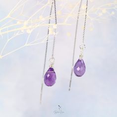 These minimalist elegant purple Amethyst teardrop ear threaders feature a beautiful faceted teardrop shape Amethyst natural stone on 925 sterling silver box chain threaders. Add these elegant purple teardrop Amethyst ear threader earrings to your everyday fine jewelry collection or as a gift for your loved one. Amethyst is a protective stone, it relieves physical and psychological pain or stress. Amethyst is one of the most spiritual stones, encouraging selflessness and spiritual wisdom. Amethyst is February birthstone, these Amethyst teardrop earrings are perfect for February born's people gift. Materials: 925 sterling silver, natural Amethyst Jewelry Care: See more information about how to care for your jewelry here. Shipping Policy: Orders will be shipped within 1-3 business days. Econo Sterling Silver Briolette Teardrop Gemstone Earrings, Sterling Silver Briolette Teardrop Earrings For Gift, Purple Sterling Silver Teardrop Earrings For Gift, Hypoallergenic Sterling Silver Threader Earrings As Gift, Sterling Silver Long Drop Teardrop Earrings For Gift, Elegant Sterling Silver Teardrop Threader Earrings, Nickel-free Sterling Silver Teardrop Threader Earrings, Faceted Drop Teardrop Earrings For Gift, Dainty Handmade Teardrop Threader Earrings