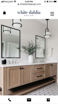 a bathroom with two sinks and mirrors on the wall next to each other in blue cabinets