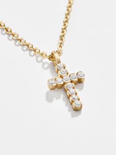 Honor your faith wearing the Agape 18K Gold Necklace. This cross pendant is crafted from 18K gold vermeil and Cubic Zirconia stones, ensuring a long-lasting, everyday style. SHOP THE ENTIRE FINE COLLECTION HERE Jewish Star Necklace, Gold Birthstone Necklace, 14k Gold Initial Necklace, Gold Medallion Necklace, Custom Initial Necklace, Wrist Jewelry, 18k Gold Necklace, Initial Necklace Gold, Personalized Pendant