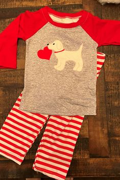 Adorable lab puppy carrying his Valentine adorn the front of this grey and red raglan shirt. Comes with matching red and white striped pant. Toddler Boy Valentine Outfit, Boys Valentines Outfit, Striped Pant, Stripe Pants