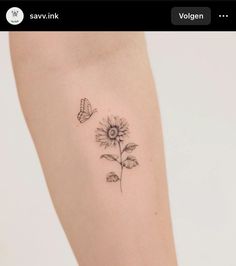 a small sunflower and butterfly tattoo on the leg