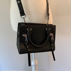 Black Leather Mini Moto Tote With Silver Hardware Detail. Never Worn Perfect Condition Rebecca Minkoff Backpack, Nude Handbag, Mini Crossbody Purse, Pink Crossbody Bag, Mini Bucket Bags, Black Suede Booties, Rebecca Minkoff Bag, Tassel Bag, Zipped Bag