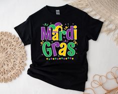 Mardi Gras Shirt, Fun 2024 Mardi Gras Party Kids Mens Womens T-Shirt, Adult Mardi Gras Sweatshirt, New Orleans Tee, Mardi Gras Sweatshirt 📌 BEST IDEA FOR GIFT: See all our tshirts! This is best gift idea for you or a friend. Perfect for Christmas, Super Bowl, Father's Day for Dad, Mother's Day for Mom, 4th of July, the perfect idea for your brother or sister. The welcome home gift they will love. These are long lasting tees, something that you can wear to a party or just a simple movie. Give them a very funny t shirt, it is something they will wear all year. Make sure it is a GREAT GIFT. 📌 ABOUT OUR PRODUCTS: - Gildan 5000 brand unisex t-shirt - Unisex Crewneck Sweatshirt Brand Gildan 18000 - Unisex Hooded Sweatshirt Brand Gildan 18500 - Unisex Long Sleeve T-Shirt Brand Gildan 24000 - La Beaded Shirt, Mardi Gras Parade, Mardi Gras Party, Cricut Silhouette