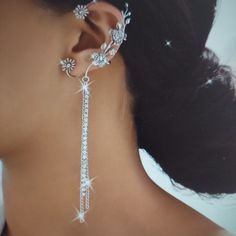 Silver Flower Design Earring Cuff Long Tassels Elegant Wedding Jewellery Ear Wrap Main Material: Steel Mosaic Material: Glass Weight: 5 grams Length 6cm+8cm(tassels) Personalization is possible Sent in a gift box Gold Dangle Ear Cuff For Wedding, Silver Jewelry With Flower Decoration For Party, Silver Party Jewelry With Flower Decoration, Elegant Silver Crystal Ear Cuff, Elegant Adjustable Wedding Ear Cuff, Elegant Adjustable Ear Cuff For Wedding, Elegant Adjustable Dangle Ear Cuff, Crystal Flower Earrings For Wedding, Elegant Dangle Ear Cuff For Wedding