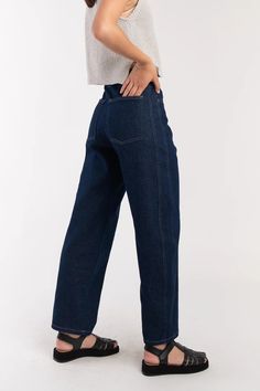 Hi-rise, relaxed fit jean with outseam piecing and slightly rounded leg shape. Jean fits true to size but you can size up for a more oversized fit. 100% Cotton Made in the USA Model wears size M Dark Indigo Jeans Outfit, Panel Jeans, Fall Wishlist, Jean Fits, Accessory Inspo, Strappy Mini Dress, Indigo Jeans, Style Guru, Denim Outerwear