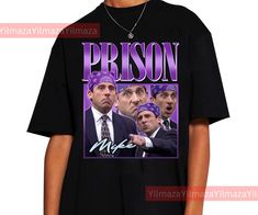 a young man wearing a black shirt with the words prison on it