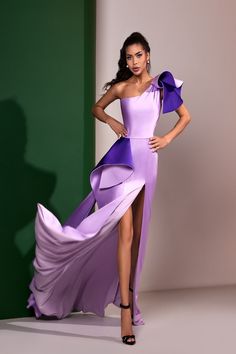 Indulge in elegance with the Sara Badr CR0038 Fall 2023 evening collection gown. Make a statement that whispers sophistication and grace. Elevate your style effortlessly. Luxury Asymmetrical Satin Dress, Purple Asymmetrical Evening Dress, Luxury Off-shoulder Asymmetrical Evening Dress, Luxury Asymmetrical Pre-draped Evening Dress, Purple Haute Couture Gowns, Exquisite Gowns, Special Occasion