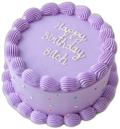 a birthday cake with purple frosting and sprinkles