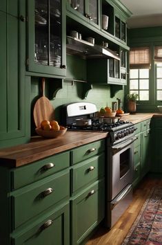 a kitchen with green cabinets and wooden counter tops, along with an area rug on the floor