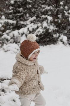 Winter classic pom pom bonnet is carefully handmade in Australia. This cute bonnet is made with high quality Japanese tweed lined with soft cotton. Unisex style perfect for winter or a cute little baby shower gift. Need a bigger size bonnets? feel free to contact us via email or Instagram to discuses options available, we would love to see bonnets on bigger kids! Please allow 2-3 weeks turnaround time for all made to order items. * Japanese tweed * Wool pom pom * Cotton Lining Size guide: 0-6m f Kids Winter Hat, Kids Winter Hats, Hat Wool, Baby Bonnets, Baby Hats Knitting, Winter Baby, Fall Baby, Baby Winter, Kids Hats