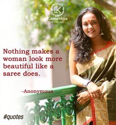 a woman standing next to a green railing with a quote about nothing makes a woman look more beautiful like a saree does