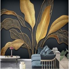 a living room with gold leaves on the wall