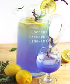 a pitcher of lavender lemonade next to some lemons