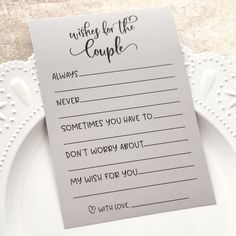 a note that is on top of a plate