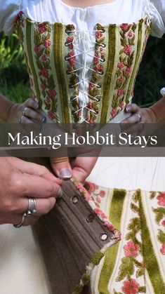 a woman in a corset is holding something with the words making hobbit stays on it