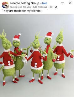 there are five green elves dressed in santa hats and holding hands together with each other