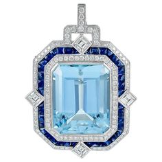 This pendant set in platinum is designed with precious aquamarine stone in the center with the total carat weight of 24.38 surrounded with stunning sapphire stone with the carat weight of 3.77, together with beautiful brilliant diamonds with the total carat weight of 3.68. Sophia D by Joseph Dardashti LTD has been known worldwide for 35 years and are inspired by classic Art Deco design that merges with modern manufacturing techniques. Chinese Pendant, Platinum Pendant, Drop Necklaces, Expensive Jewelry Luxury, High Jewellery, Aquamarine Pendant, Colored Stone, Art Deco Necklace, White Gold Necklaces