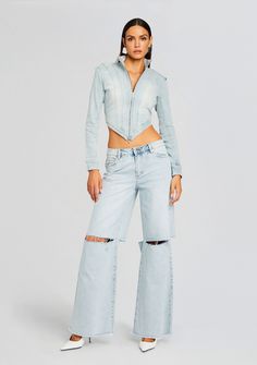 Unlock optimum edginess in SER.O.YA's Wrenley Low-Rise Jean. These must-have light wash denim jeans feature knee slits in the front and back and a low-rise baggy fit to add a touch of laid-back coolness to your wardrobe. Shown here in Skylight. 100% Cotton Made in China Model is 5'11" wearing size 26 Style No. 3451-14 Light Wash Denim Jeans, Low Rise Jean, Hemant And Nandita, Denim Sweater, Rehearsal Dress, Jumpsuit Jacket, Sequin Sweater, Low Rise Jeans, Swimwear Sale