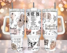 three tumblers with different designs on them and the words she is surrounded by flowers