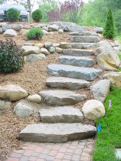 stone steps leading up to the parking lot