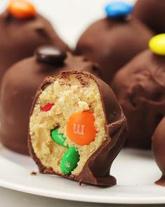 chocolate candies with candy in the middle on a plate