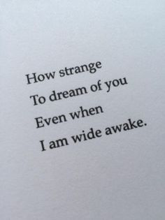 an open book with the words how strange to dream of you even when i am wide awake