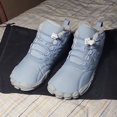 Barefoot Ramblers Are A Light Blue With Gray Soles. Fully Fleece Lined. Never Worn. Blue Synthetic Hiking Sneakers, Blue Synthetic Sneakers For Hiking, Blue Boots With Rubber Sole For Outdoor Activities, Sporty Blue Boots With Round Toe, Blue Round Toe Hiking Sneakers, Blue Sporty Boots For Sports, Blue Lace-up Sports Boots, Blue High-top Boots For Sports, Casual Blue Boots For Outdoor