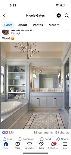 the bathroom is decorated in white and has a chandelier hanging from the ceiling