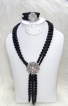 Handmade Black Beautiful Luscious Quality Pearls Necklace Bracelet Earring Jewellery Set UK Rapid dispatch Complete Set is Necklace Earring and bracelet Buying more that 1 Jewellery set, we offer wholesale and bulk prices for all our jewellery. Multi-strand Polished Beads Jewelry For Parties, Costume Jewelry With Black Beads For Party, Black Beads Costume Jewelry For Party, Elegant Adjustable Crystal Beads, Formal Multi-strand Black Bead Jewelry, Elegant Black Beaded Crystal Jewelry, Costume Jewelry With Black Round Beads, Black Multi-strand Costume Jewelry, Elegant Black Adjustable Jewelry Sets