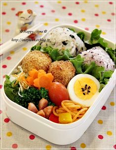 a bento box filled with different types of food