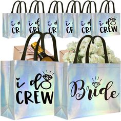 six bags with the words i do crew on them and some flowers in front of them