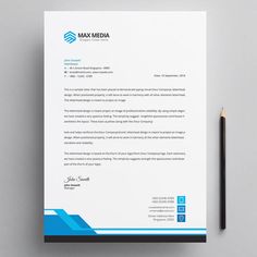 a letterhead and business card on top of a desk