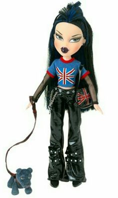 a doll with black hair and blue shirt holding a leash next to a stuffed animal