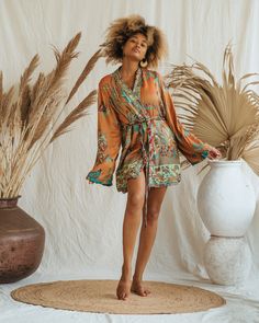 Our Short Kimono offers an easy, relaxed fit, combining comfort with understated elegance. Its fluid silhouette adds a touch of effortless charm to any outfit, making it a versatile piece for both casual days and special moments.