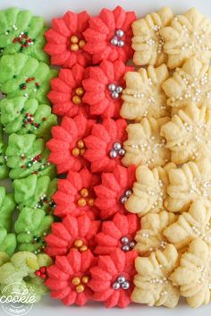 some very pretty looking cookies in the shape of flowers