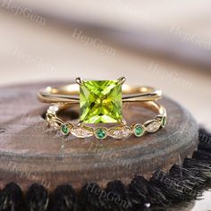 Princess Peridot Ring Set,Silver Rose Gold Bridal Set,Peridot Solitaire Ring Set,Half Eternity Emerald Ring,Birthstone Wedding Ring Gift Specifications: ►Sold As a Natural Peridot Engagement Ring Set(This purchase includes 2 PCS ring.) Engagement Ring ►Material: Available in Silver & Solid 10K/ 14K/ 18k Rose/Yellow,/White,Gold ►Center stone: Princess Cut [7mm] Natural Peridot. 1.25Carat.(Approx.) ►Band Width: Approx. 1.6mm(Bottom) ►Prong Setting,micro pave Wedding Ring ►Material: Available in Si Yellow Gold Peridot Stackable Rings For Wedding, Wedding Stackable Peridot Rings With Birthstones, Wedding Stackable Peridot Rings, Peridot Birthstone Ring With Center Stone For Wedding, Stackable Peridot Wedding Jewelry, Green Stackable Wedding Rings For May Birthstone, Elegant Peridot Birthstone Ring For Wedding, Peridot Birthstone Ring For Wedding, Green Stackable Wedding Rings Fine Jewelry