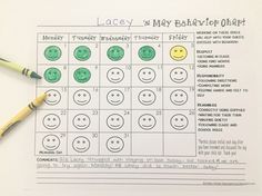 a calendar with smiley faces on it next to a pencil and marker, which reads lacy is my behavior chart