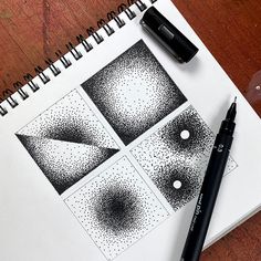 a pen and some drawings on top of a paper