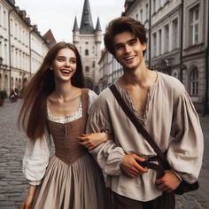 a man and woman standing next to each other on a cobblestone street with buildings in the background