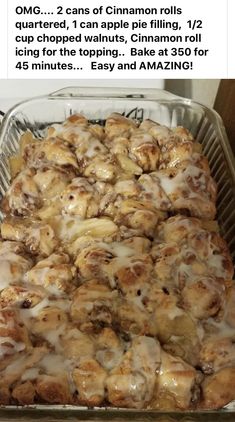 a pan filled with cinnamon rolls covered in icing