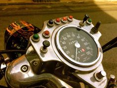 a close up of a speedometer on a motorcycle