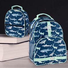 See store for other patterns! Perfectly sized for school age kids, these bags are large enough to carry your children's school books and required day-to-day school supplies and still leave room for a change of clothes for playtime after class. All Over Print Backpacks are durable enough that they also make for a great summer camp or sports bag. This backpack has many of the same features found on adult size bags- three storage compartments, padded and adjustable shoulder straps for comfort, double sided mesh water bottle pockets, two outside hook-on straps, and an inside elastic pocket with name tag. Be sure to gear up with the matching Stephen Joseph All Over Print Lunchboxes. Want to make it even more individual? Then why not personalize it with your child's initials or name?   Backpack Playful Green Lunch Bag For School, Green Lunch Bag For School, School Backpack For Back To School, Cute Lunch Bag For School Year End, Blue Lunch Bag For Back To School, Cute School Lunch Bag For Back To School, Cute Lunch Bag For Back To School, Cute Back To School Lunch Bag, Rectangular School Event Backpack