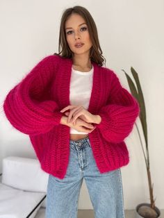 Oversized mohair buttoned cardigan. Stylish and bright purple chunky cardigan will not leave you indifferent, as well as those around you. Lightweight and warm, very fluffy. Gray size S - length 21.65 inch (55 cm) width 19.68 inches (50 cm) Violet Size M-XL: Width 25.59 inches (65 cm) Length 23.6 inches (60 cm) Pink Size M-XL: Width 25.59 inches (65 cm) Length 23.6 inches (60 cm) Composition: 25% mohair, 24% wool, 51% acrylic May tingle slightly for very sensitive skin CARE: Please treat your ne Pink Cardigan Outfit, Bright Winter Outfits, Sleeve Patterns, Basic Knitting, Hot Pink Cardigan, Handmade Cardigan, Buttoned Cardigan, Fluffy Cardigan, Sweater Chunky