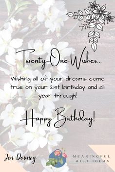 a birthday card with white flowers on it